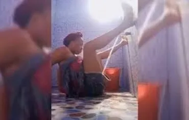 Naughty girl enjoying tap water on her pussy